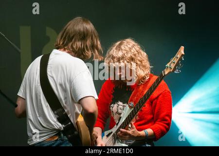 Sam Willmett (guitar) and Tilly Harris (bass) of Welsh band The Bug Club at Green Man Festival in Wales, UK, August 2023. Photo: Rob Watkins Stock Photo