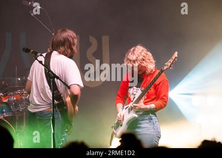 Sam Willmett (guitar) and Tilly Harris (bass) of Welsh band The Bug Club at Green Man Festival in Wales, UK, August 2023. Photo: Rob Watkins Stock Photo