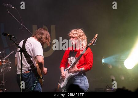 Sam Willmett (guitar) and Tilly Harris (bass) of Welsh band The Bug Club at Green Man Festival in Wales, UK, August 2023. Photo: Rob Watkins Stock Photo