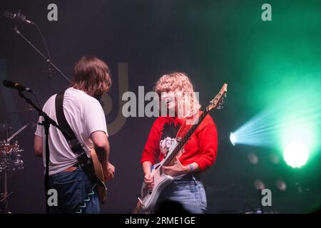 Sam Willmett (guitar) and Tilly Harris (bass) of Welsh band The Bug Club at Green Man Festival in Wales, UK, August 2023. Photo: Rob Watkins Stock Photo