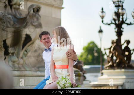 Just married couple on the Alexandre III bridge in Paris Stock Photo