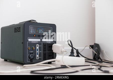 portable power station, powering the home and outdoor activities. Stock Photo
