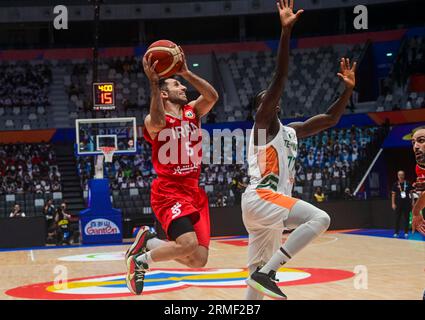 JAKARTA, Aug. 28, 2023 (Xinhua) -- Bazoumana Kone (R) of Cote d'Ivoire ...