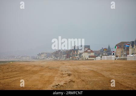 View of Villers-sur-Mer in Lower Normandy, France on a foggy day at low tide Stock Photo