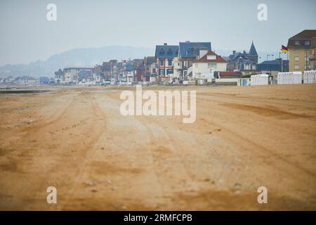 View of Villers-sur-Mer in Lower Normandy, France on a foggy day at low tide Stock Photo