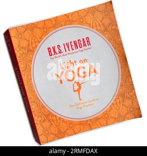 B.K.S. Iyengar - Light On Yoga - The Definitive Guide to Yoga Practice. Book cover on white background Stock Photo