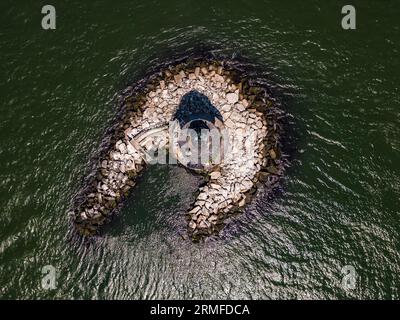 An aerial view of the Orient Point lighthouse out on Long Island, New York on a sunny day Stock Photo