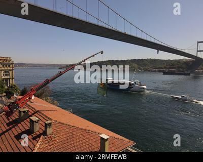 window installation company installs windows using a crane. captured by a drone Stock Photo