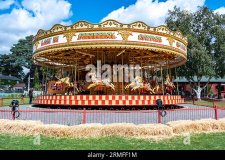 Bressingham, Norfolk, UK – August 21 2023. Traditional Victorian merry-go-around or carousel Stock Photo