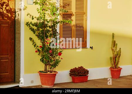 Typical colorful Italian houses on a street of Bosa, Sardinia, Italy Stock Photo