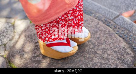 Maiko on traditional tabi and geta in Japan Stock Photo