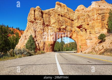 Red Arch road tunnel on the way to Bryce Canyon National Park, Utah, USA Stock Photo