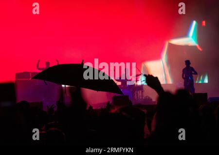 The Comet Is Coming play during a massive rainstorm on the Mountain Stage at Green Man Festival in Wales, UK, August 2023. Photo: Rob Watkins Stock Photo