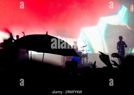 The Comet Is Coming play during a massive rainstorm on the Mountain Stage at Green Man Festival in Wales, UK, August 2023. Photo: Rob Watkins Stock Photo