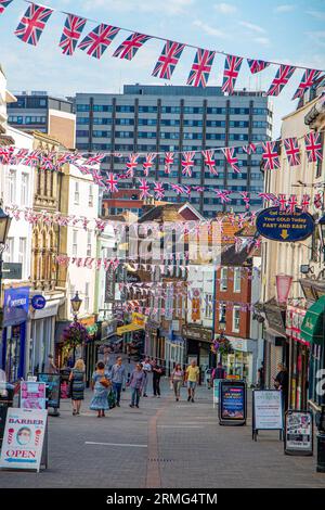 Bunting over a pedestrianized street in Maidstone Town Centre. Stock Photo