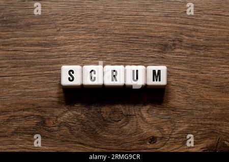 Scrum - word concept on building blocks, text Stock Photo