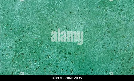 Green emerald stone background, wall or floor. Abstract texture for graphic design or wallpaper. Stock Photo