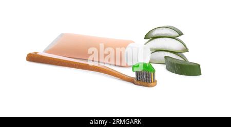 Tube of toothpaste, brush and cut aloe vera on white background Stock Photo
