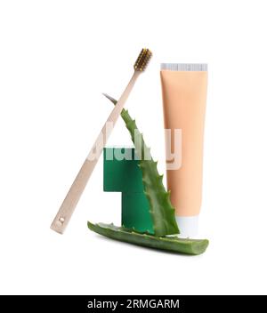 Tube of toothpaste, brush and aloe vera leaves on white background Stock Photo