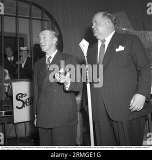 Laurel and Hardy were a British-American comedy duo act during the early Classical Hollywood era of American cinema, consisting of Englishman Stan Laurel (1890–1965) and American Oliver Hardy (1892–1957). Pictured when visiting Sweden and Stockholm 1947. ref AE14-12 Stock Photo