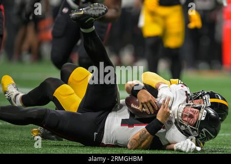 Atlanta Falcons quarterback Taylor Heinicke gets up after being sacked by  the Pittsburgh Steelers during the first half of a preseason NFL football  game Thursday, Aug. 24, 2023, in Atlanta. (AP Photo/Gerald