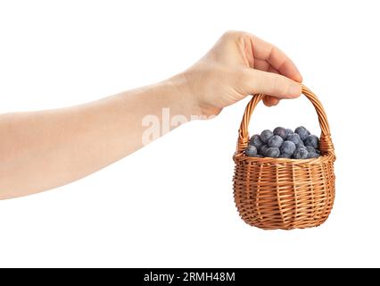blueberries basket in hand path isolated on white Stock Photo