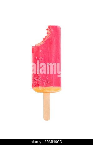 Ice cream on a stick with a bite mark isolated on white background. Ice cream or fruit ice isolated on a white background. Yellow, orange and red Stock Photo