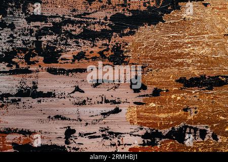 Abstract wall painting with black oil strokes and glow shine gold bronze texture background. Contemporary art. Modern design Stock Photo