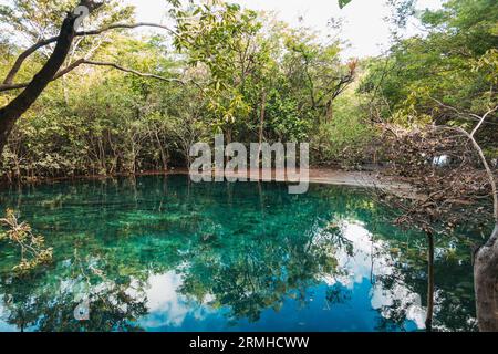 crystal clear waters of Crater Azul (Blue Crater) in northern Guatemala Stock Photo