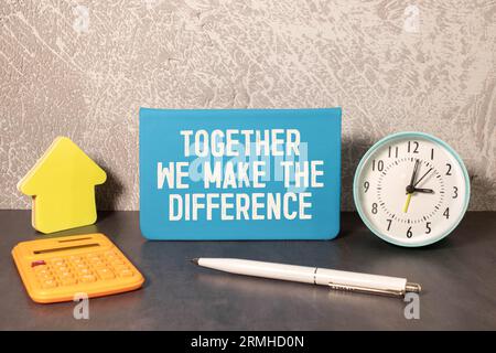 Text together we make the difference on the short note texture background. Stock Photo