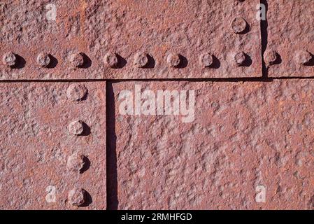 rusty corroded riveted iron metal background Stock Photo