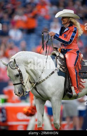 Rider Ann Judge guides Thunder during a ceremonial run after the Denver  Broncos scored in the first half of an NFL preseason football game  Saturday, Aug. 26, 2023, in Denver. (AP Photo/David