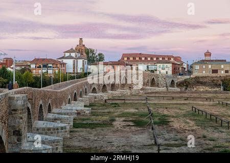 The multi-arched Gothic Bridge leading into Hospital de Orbigo initially constructed in the 13c has been rebuilt many times. A medieval jousting fair Stock Photo