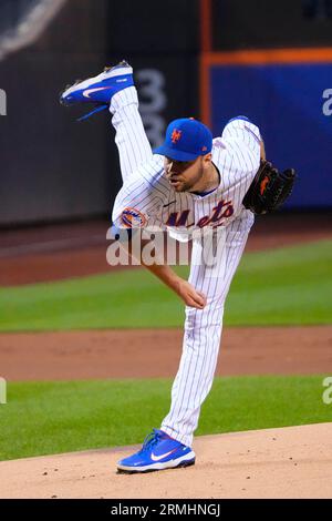 FLUSHING, NY - AUGUST 28: New York Mets Pitcher Tylor Megill (38) delivers  a pitch during the first inning of.a Major League Baseball game between the  Texas Rangers and the New York