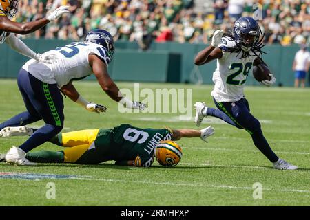 Green Bay Packers safety Dallin Leavitt (6) runs down the field