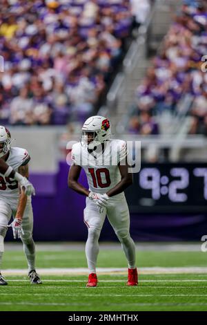 Arizona Cardinals wide receiver Davion Davis (10) runs down the field  during the first half of an NFL preseason football game against the  Minnesota Vikings, Saturday, Aug. 26, 2023, in Minneapolis. (AP