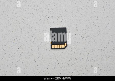 Close up of SD and microSD cards, symbols of compact and efficient storage on chips. Detail of SD and microSD cards, representing the modern concept o Stock Photo