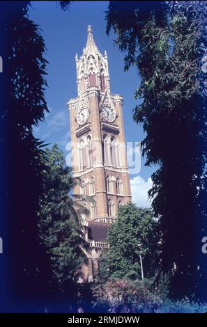 The Rajabai Tower is a clock tower in South Mumbai India. It is in the confines of the Fort campus of the University of Mumbai. It stands at a height of 85 m. The tower is part of The Victorian and Art Deco Ensemble of Mumbai, which was added to the list of World Heritage Sites in 2018. Stock Photo