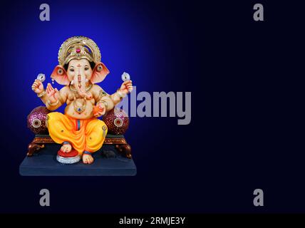 Photograph of Lord ganapati Idol, Hindu God Ganesha background, Ganesha Idol, Ganesh festival. Stock Photo