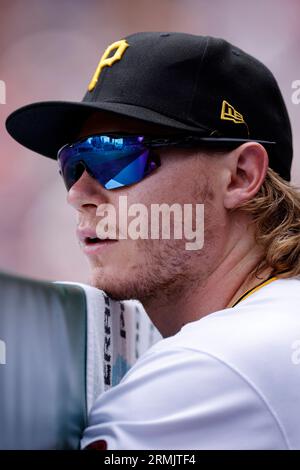 Pittsburgh Pirates center fielder Jack Suwinski looks out of the dugout  before the start of a baseball game against the Miami Marlins, Friday, June  23, 2023, in Miami. (AP Photo/Wilfredo Lee Stock