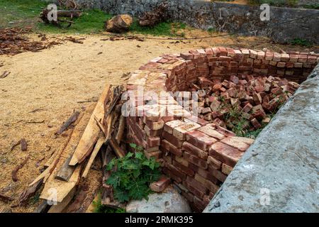 Building compact brick water harvesting tanks in rural Uttarakhand, India, for sustainable water conservation. Stock Photo