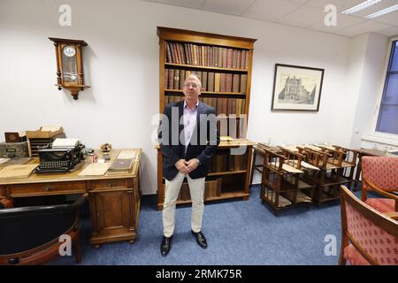 Jena, Germany. 29th Aug, 2023. Markus Ortlieb, Head of the Jena Sub-Office of the German Patent and Trade Mark Office, stands in the historical archive of his office. At a press conference, information was provided on the further expansion of the Jena office. Credit: Bodo Schackow/dpa/Alamy Live News Stock Photo