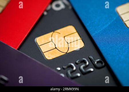 Stacked credit cards with chip, close up view with selective focus for background Stock Photo