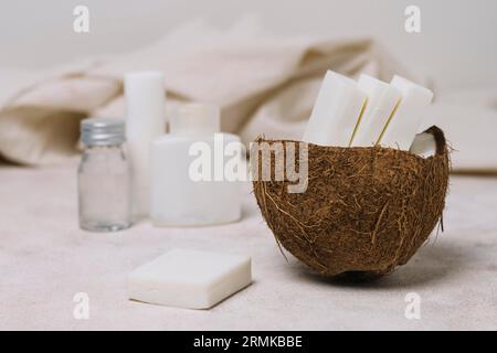 Coconut soap bars coconut bowl with oils Stock Photo