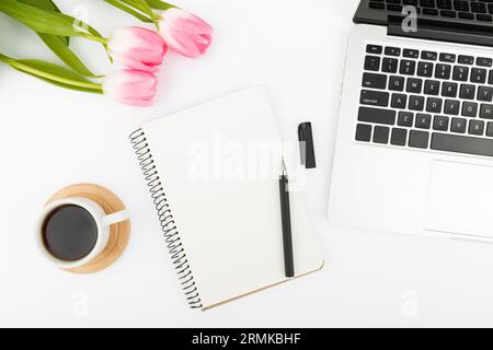 Flat lay desk concept with tulips Stock Photo