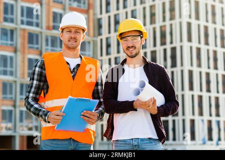 Medium shot engineer architect looking camera Stock Photo