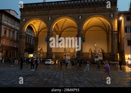 The illuminated wide arches of the Loggia del Lani are an open-air sculpture museum next door to the Uffizi Gallery and the Palazzo Vecchio ( Florence Stock Photo