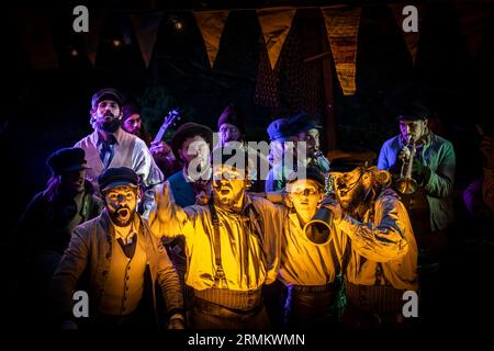 Old Time Sailors performing at Trebah Garden Amphitheatre in Cornwall in the UK. Stock Photo