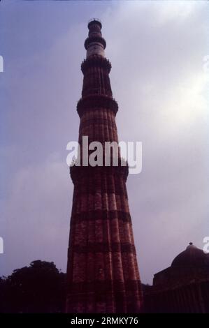 The Qutb Minar, also spelled Qutub Minar and Qutab Minar, is a minaret and 'victory tower' that forms part of the Qutb complex, which lies at the site of Delhi’s oldest fortified city, Lal Kot, founded by the Tomar Rajputs. It is a UNESCO World Heritage Site in the Mehrauli area of South Delhi, India. Built of red and buff sandstone and eloquently carved with inscriptional bands, the Qutb Minar is the tallest masonry tower in India, measuring 72.5 metres high, with projecting balconies for calling all Muadhdhin to prayer. Stock Photo