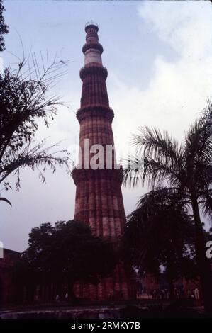 The Qutb Minar, also spelled Qutub Minar and Qutab Minar, is a minaret and 'victory tower' that forms part of the Qutb complex, which lies at the site of Delhi’s oldest fortified city, Lal Kot, founded by the Tomar Rajputs. It is a UNESCO World Heritage Site in the Mehrauli area of South Delhi, India. Built of red and buff sandstone and eloquently carved with inscriptional bands, the Qutb Minar is the tallest masonry tower in India, measuring 72.5 metres high, with projecting balconies for calling all Muadhdhin to prayer. Stock Photo
